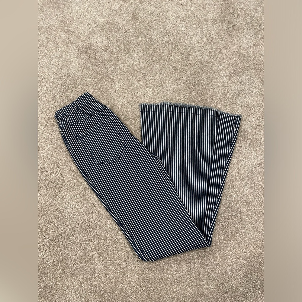 Striped navy and white bell bottoms with elastic waste. Size medium.